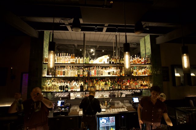 Upscale Bar with Illuminated Bottle Display