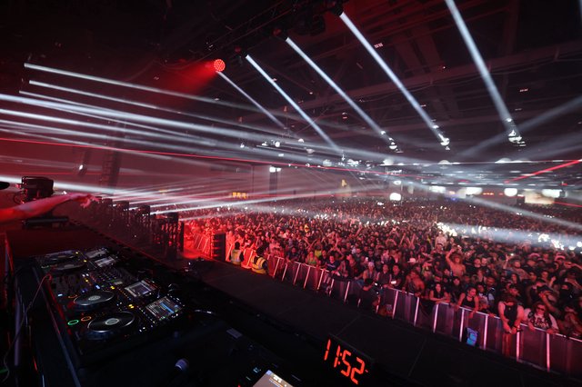 Massive EDM Crowd Erupts Under Laser Light Show
