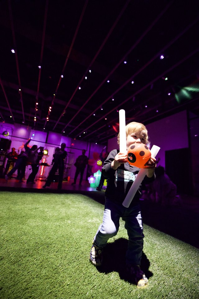 Young Child Celebrates at Baby Rave Dance Party