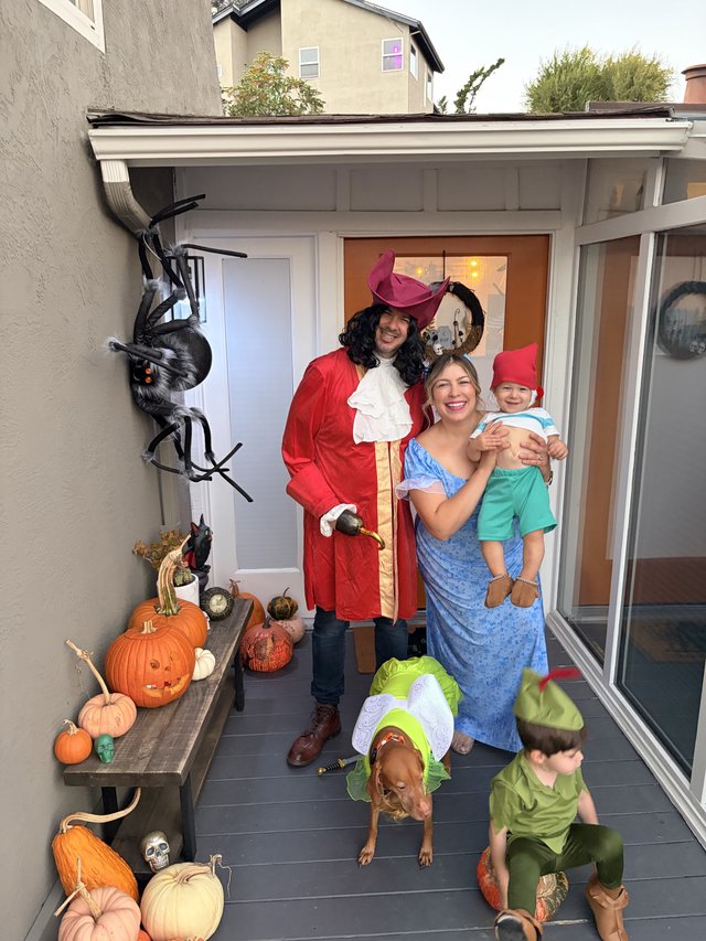 Peter Pan Family Halloween Costume on Decorated Porch
