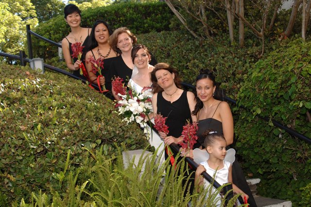 Bridal Party Poses on Garden Staircase Wedding Day