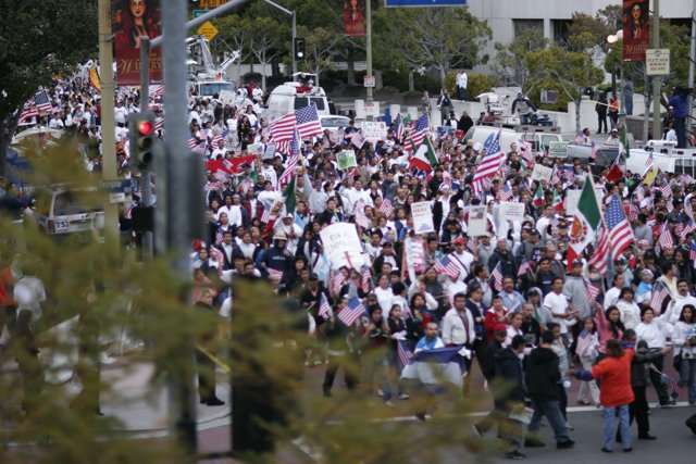 Patriotic Protesters March with American Flags and Signs