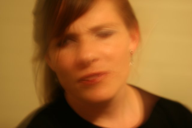 Motion Blur Portrait of Woman in Warm Light