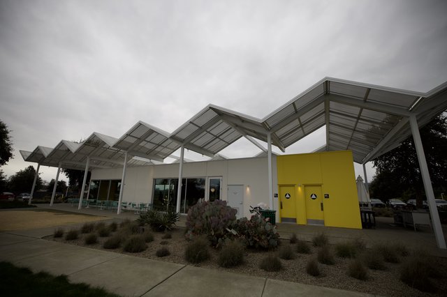 Modern Wave Canopy Architecture at Dusk