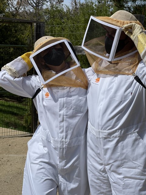 Beekeepers in Protective Gear