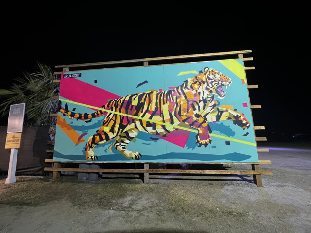 Wild and Colorful Tiger Mural on Wooden Billboard