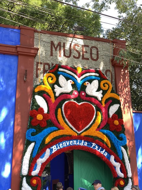 Colorful Heart and Bird Mural on Miguel Hidalgo Building