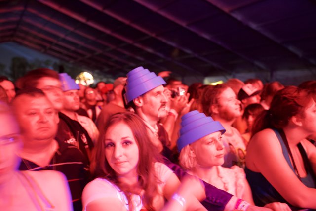 Nightclub Fun with Hats and a Crowded Crowd