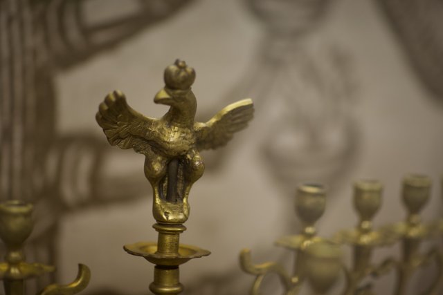 The Golden Bird on a Candle Holder