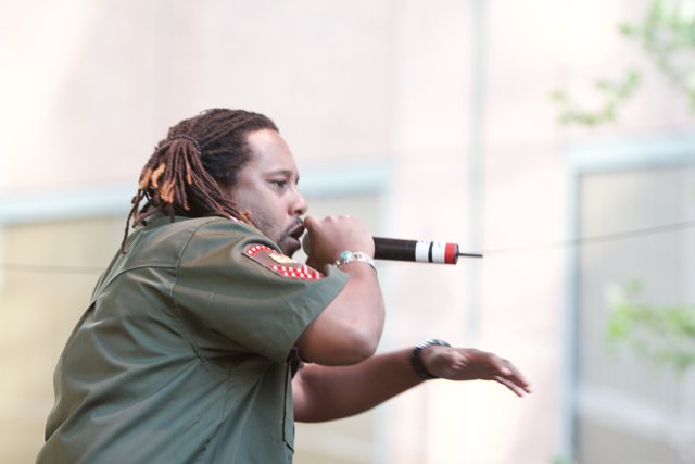 Dreadlocked Performer Takes the Stage