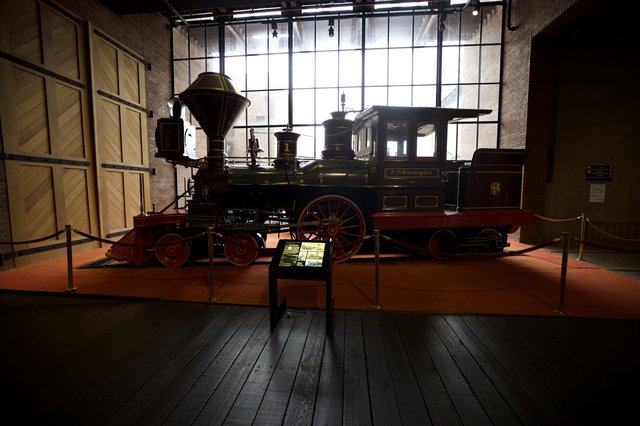Historic Steam Locomotive Display in Museum Gallery