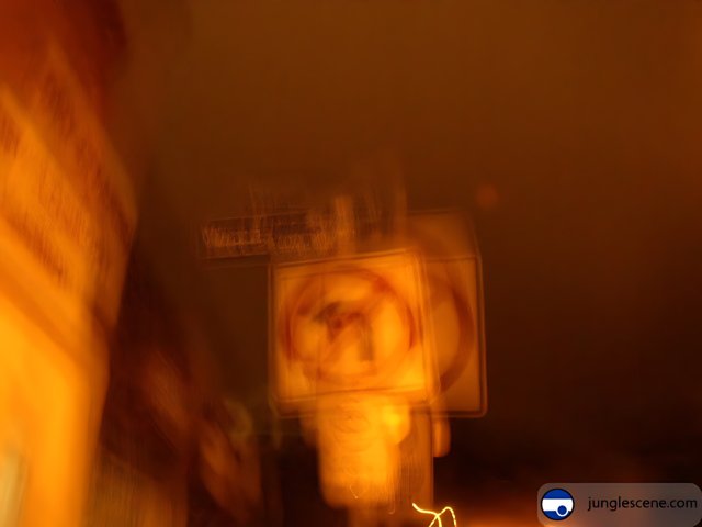 Blurry Night-time Street Sign