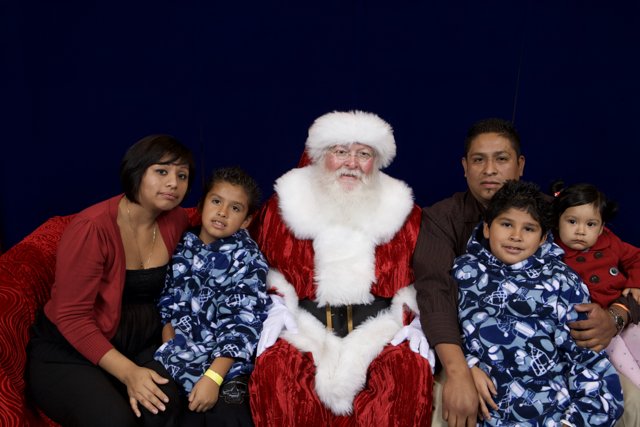 Family Christmas photo with Santa Claus