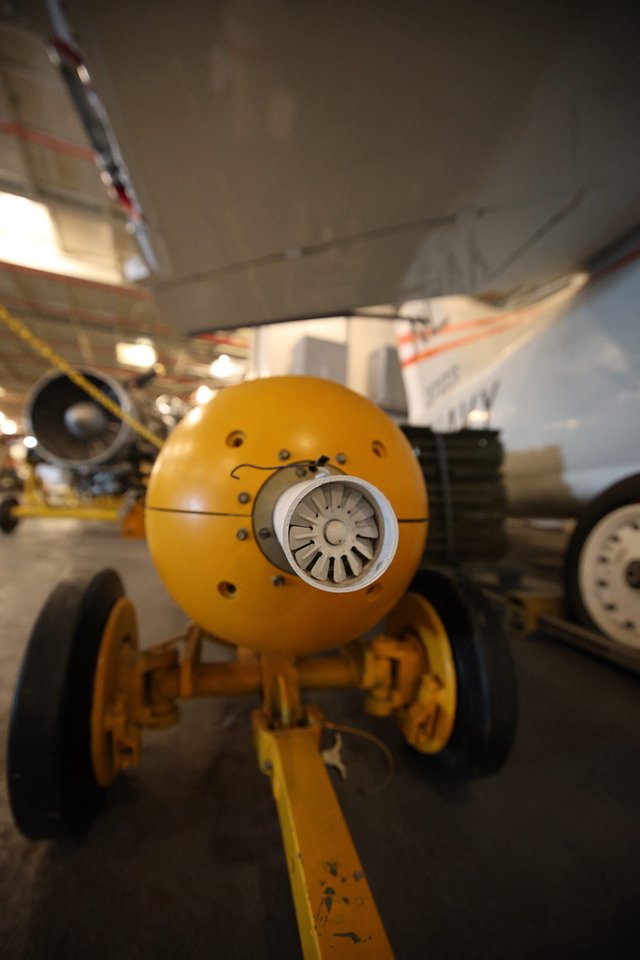 Vintage Aircraft Engine Close-up in Museum Hangar