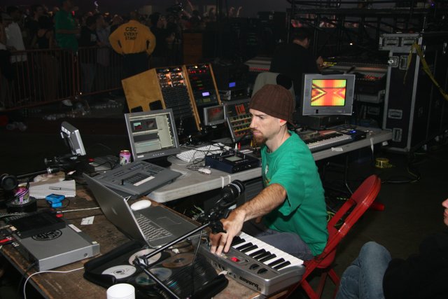 Green-Shirted Musician at the Keyboard