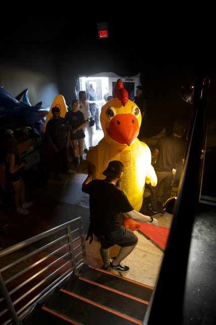 Backstage Eccentricity: The Giant Inflatable Rooster at Coachella 2024