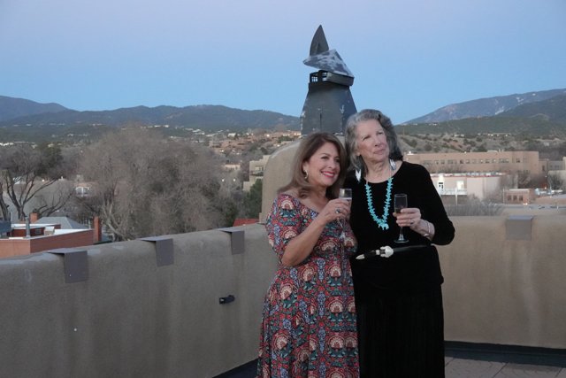 A Rooftop Portrait of Rhoda and Maria with a Mountainous View