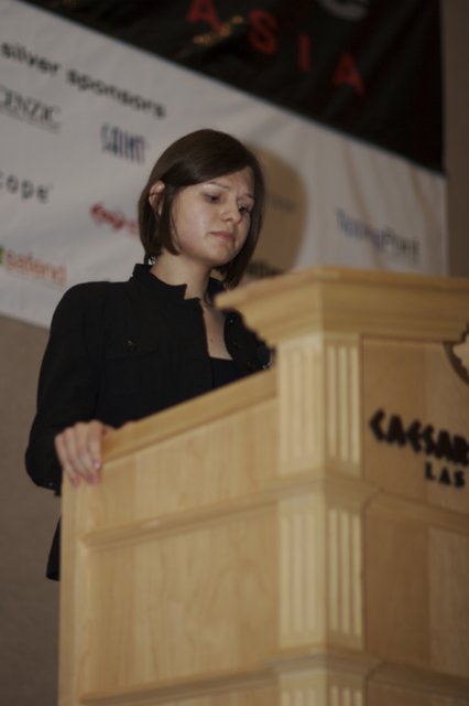 Joanna Rutkowska Speaks at Podium