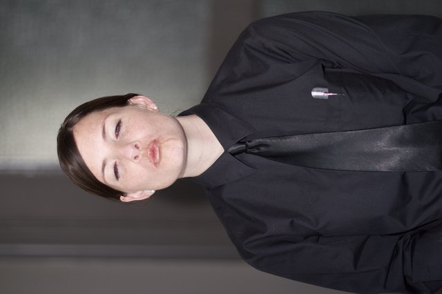 Deadpan Security Guard Portrait with Pouty Expression