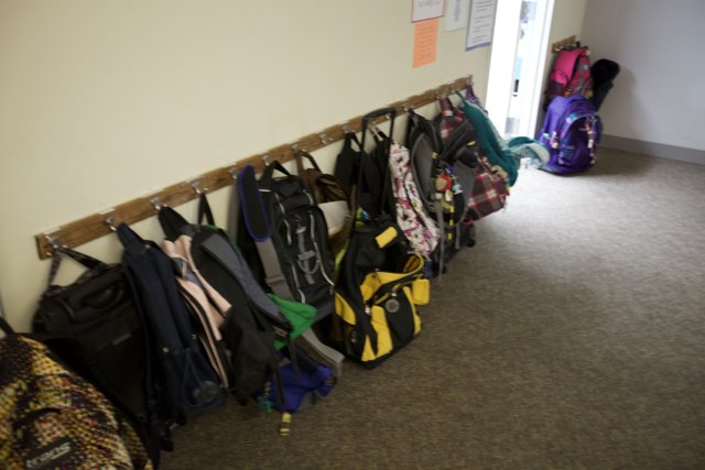 A Wall of Backpacks and Bags