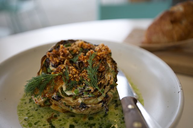 Roasted Cabbage with Sesame and Herb Garnish at Fine Dining Restaurant