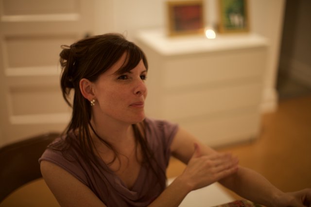 Thoughtful Woman in Warm Gallery Evening Light