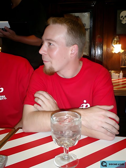 Red Shirted Man at Restaurant