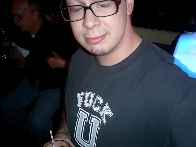 Dave B Sporting Glasses and a T-Shirt
