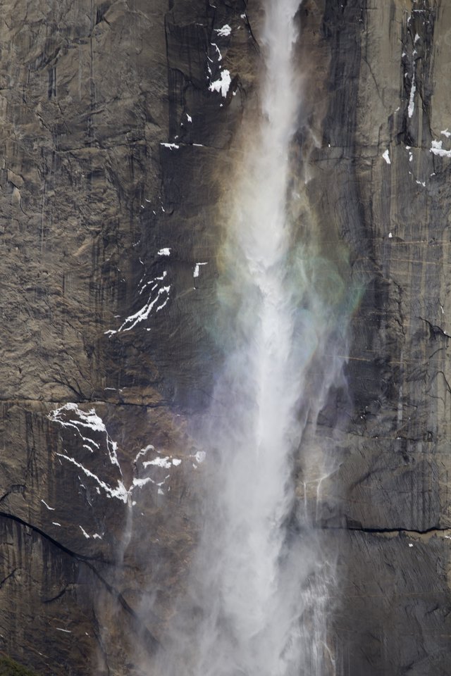 Yosemite Valley Waterfall Cascading Down Granite Cliff Face