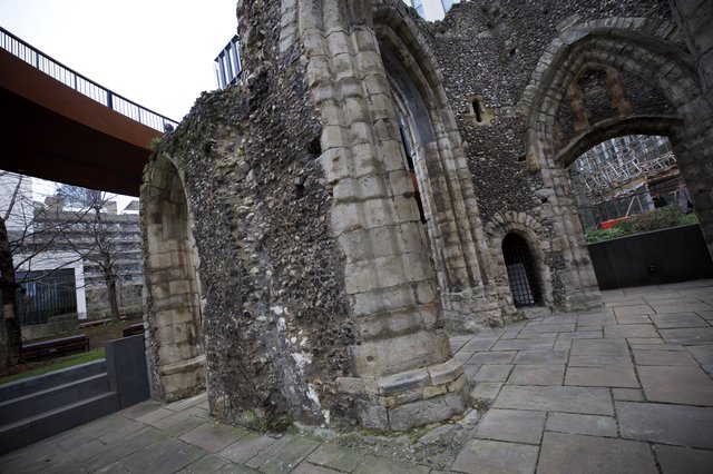 Medieval Church Ruins with Modern Urban Architecture