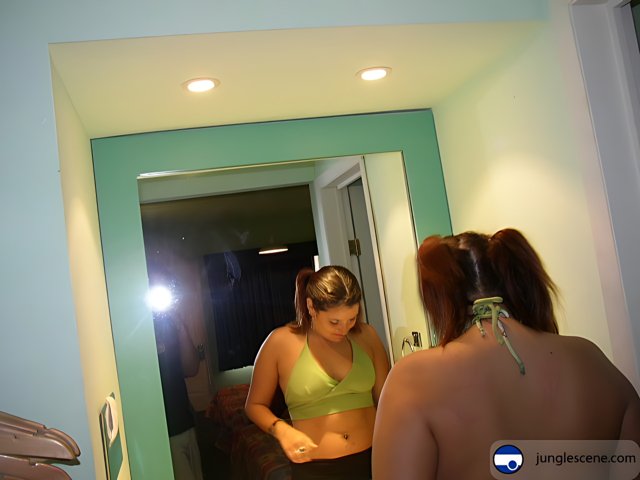 Mirror Reflection of Two Women in a Dressing Room