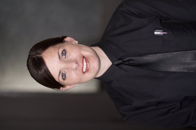 Professional Woman in Black Uniform Portrait