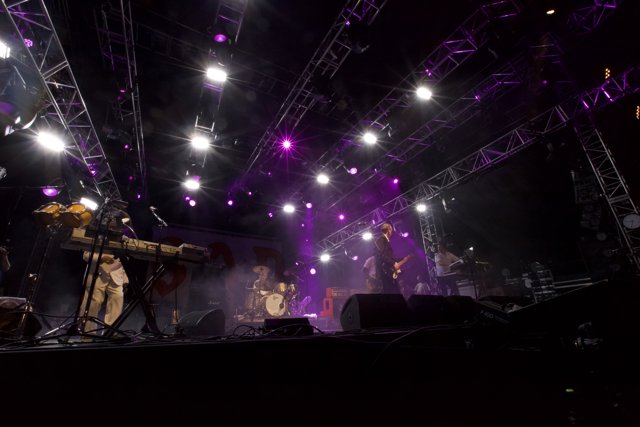 Purple Haze: A Rock Band's Performance Under The Spotlight