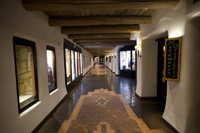 Southwestern Adobe Corridor with Decorative Tile Runner