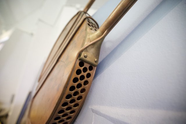 Vintage Brass Telephone Handset Close-Up Detail
