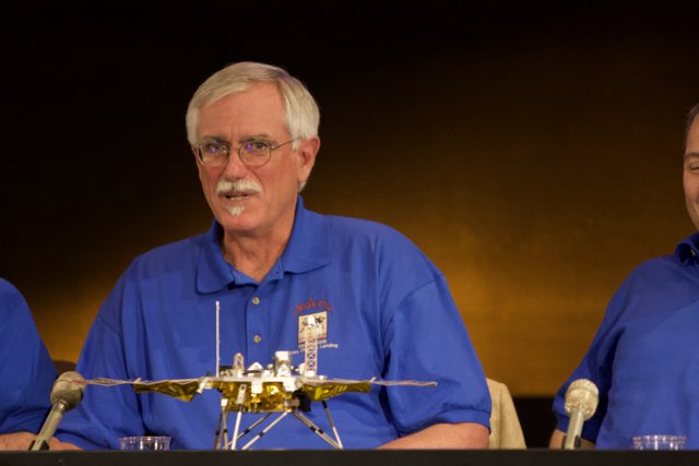 Blue Shirted Men at Phoenix Landing Press Conference