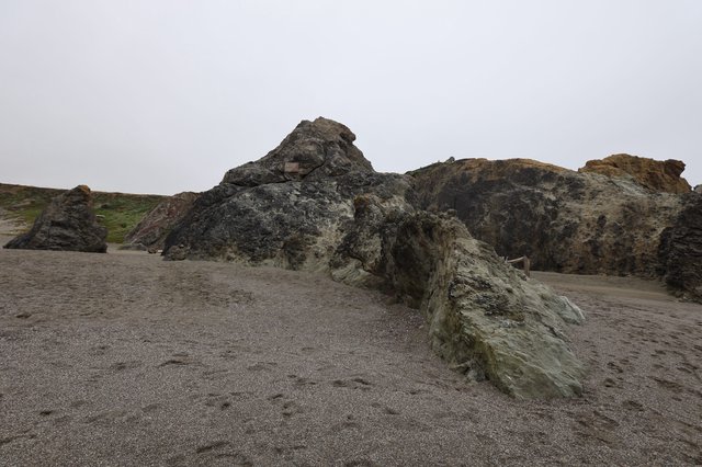 Ancient Coastal Rocks on a Misty California Beach