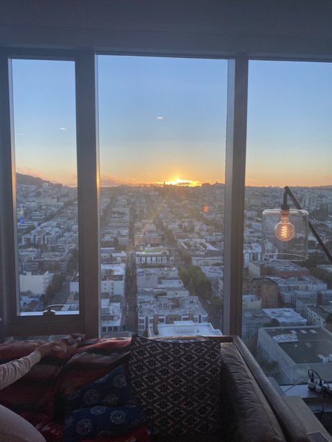 Window view of San Francisco sunset