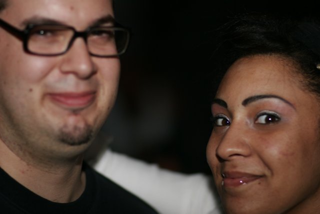 Smiling Couple with Stylized Eyeglasses