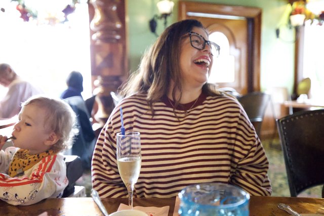 Joyful Celebration at Restaurant with Family