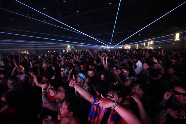 Massive Crowd Electrified by Laser Light Show