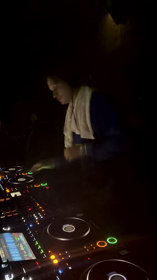 DJ Performance in Darkened London Nightclub