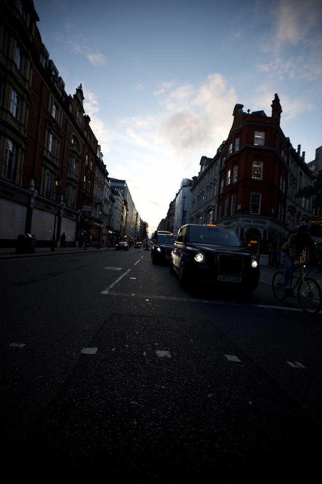 Black Cab on London Street at Dusk