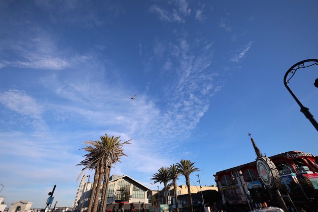 Twilight Sky Over Coastal Boardwalk Entertainment District