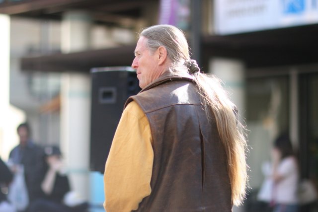 Man in Long Hair and Jacket