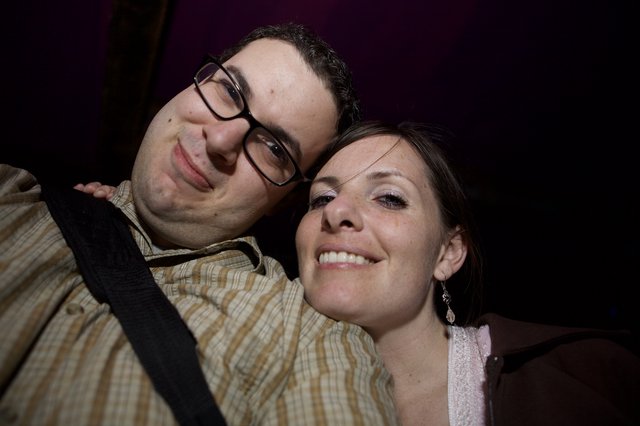 Smiling Couple Close-Up at Nighttime Event
