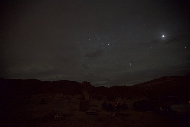 Moon and Venus in the Starry Desert Sky