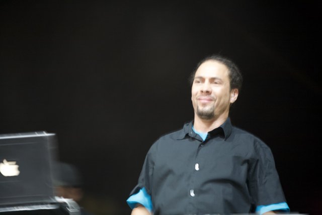 Roni Size Poses with Laptop at Coachella