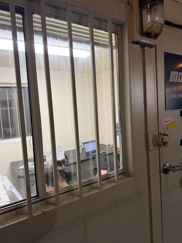 Workspace View Through Security Bars in Urban Building