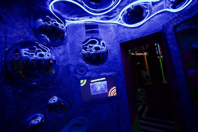 Immersive UV Light Installation in Interactive Art Space